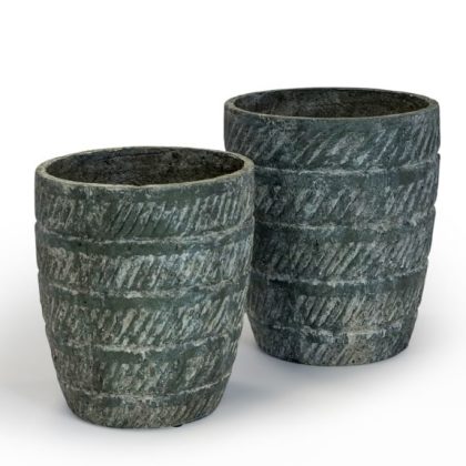 Plant up in style with this large recycled stone effect planter . Superb ridged design on this round planter. Eco friendly too.43 x 38.5 x 38.5cm and the smaller version measures in at 34.5 x 34.5 x 37.5cm